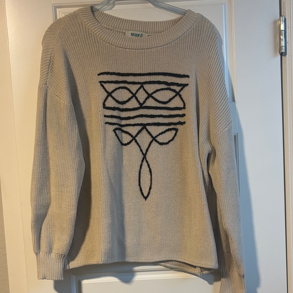 Elegant Beige Sweater with Black Design